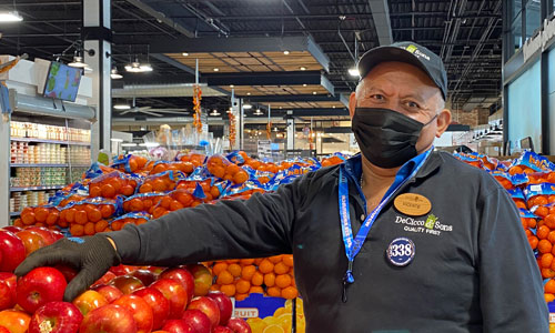 Member picking produce