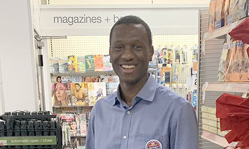 Member cheerfully laughing at the camera 