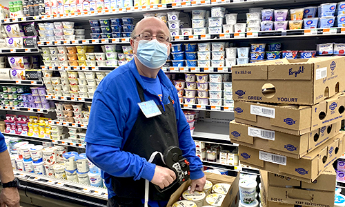 Member putting price tags on items